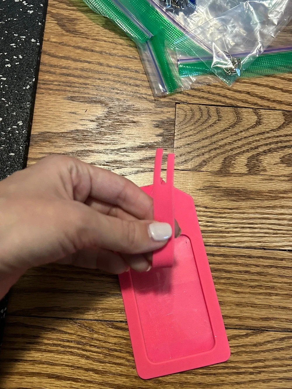 Kate Spade pink and orange luggage tag with flaw